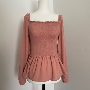 Pink shoulder cut peplum shirt
